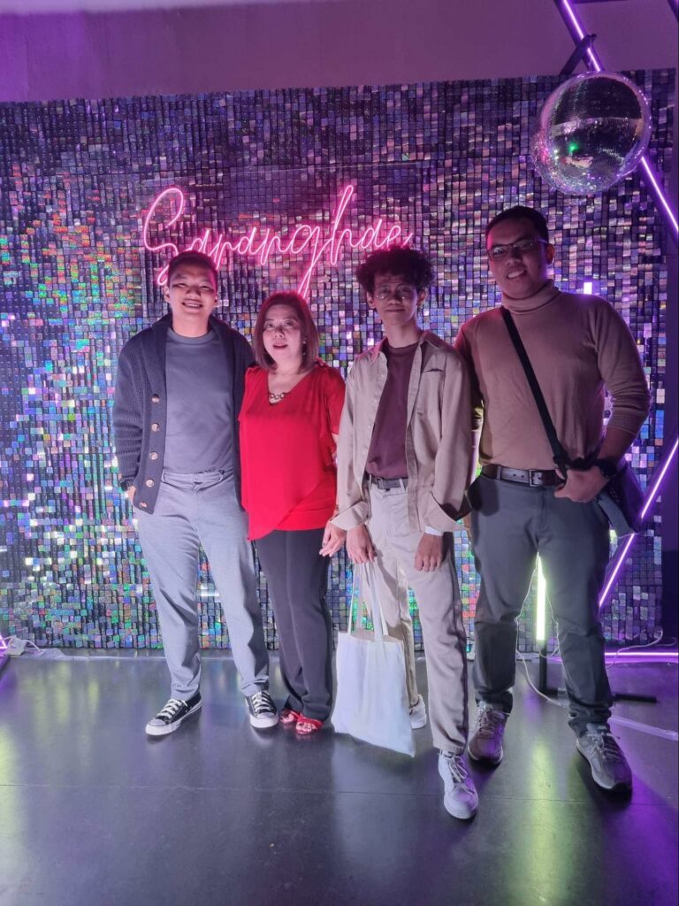 John Mark with his teammates at the Booth & Partners 2022 Year-end Party