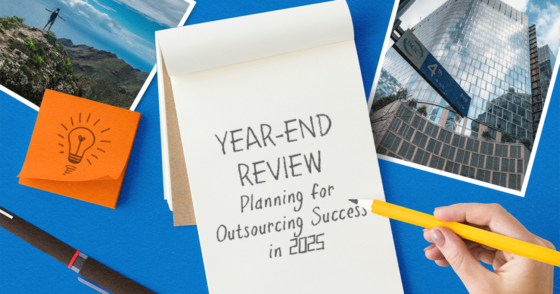 notepad with writing that says year-end review planning for outsourcing success in 2025